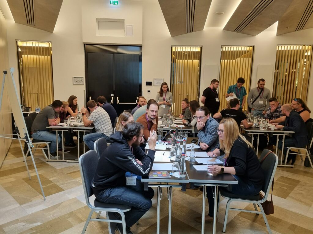 a group of people sitting around a table